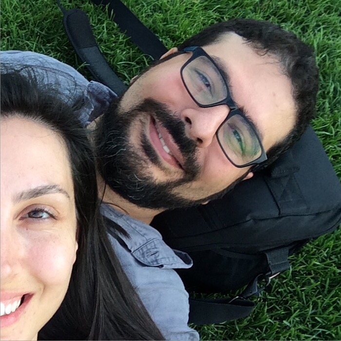 myself and my wife lying on the grass, headshot.